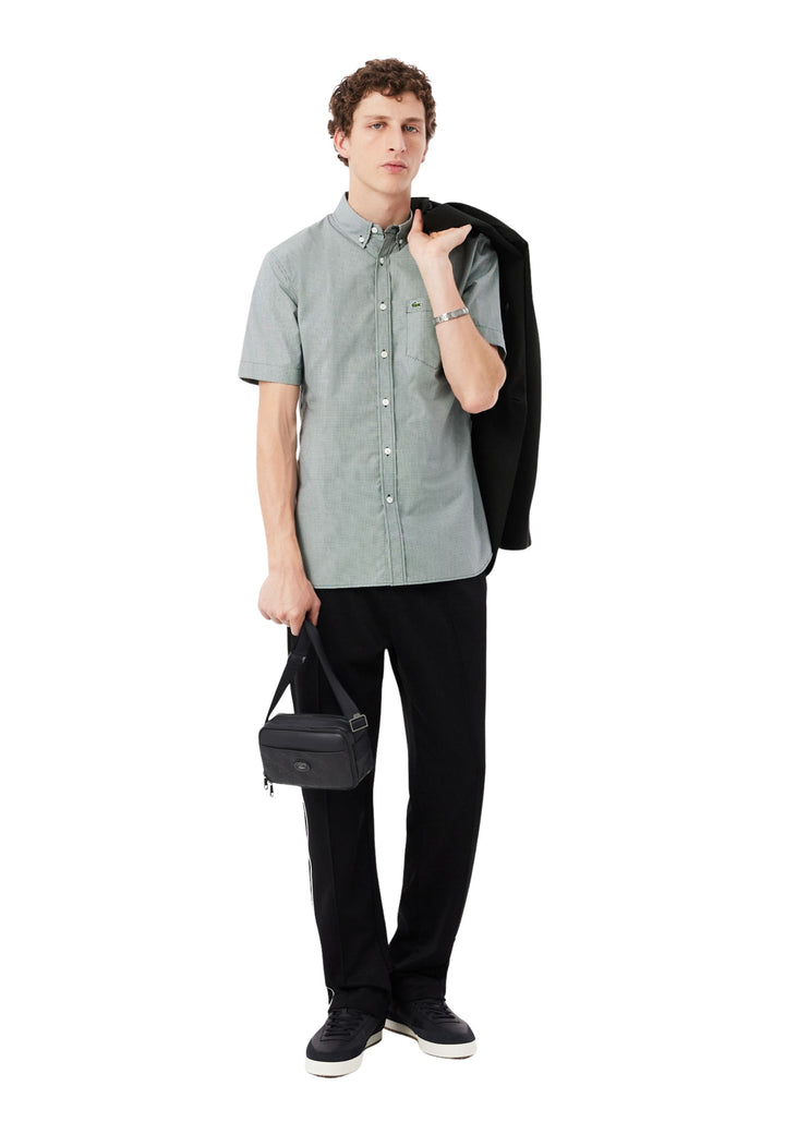 Lacoste Sacoche monogramme en cuir Noir
